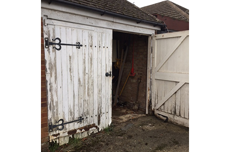 Damaged Side Hinged Garage Doors